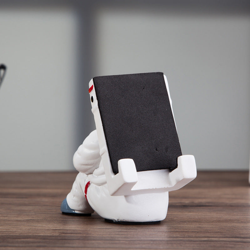 Cute Astronaut Resin Desktop Phone Stand For Students And Home Use